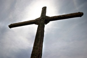 >at the foot of the cross